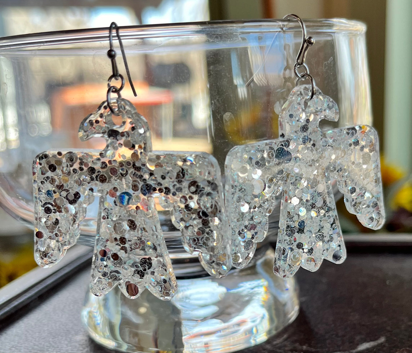 Aztec Thunderbird silver glitter & clear resin earrings
