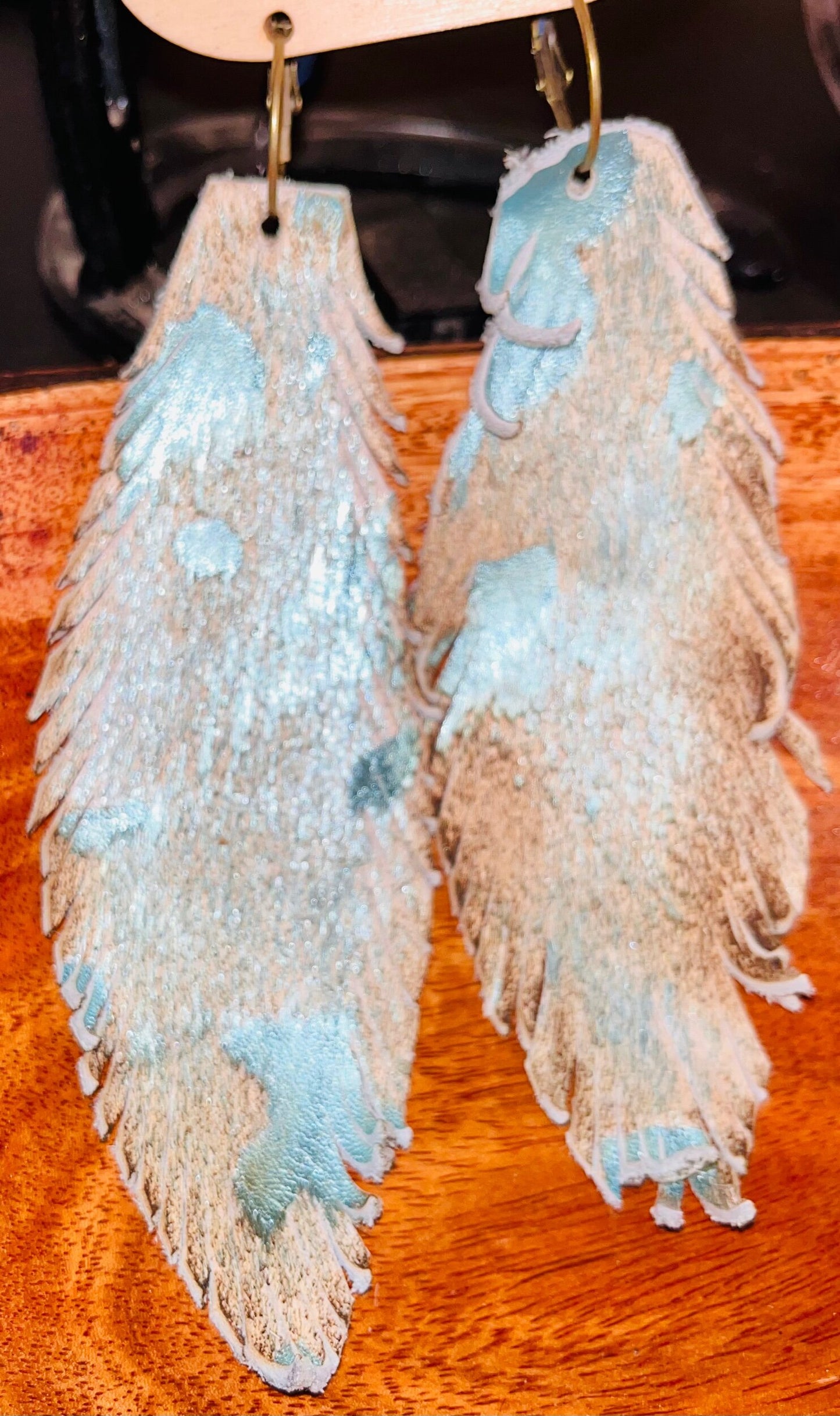 White cowhide with turquoise acid washed earrings