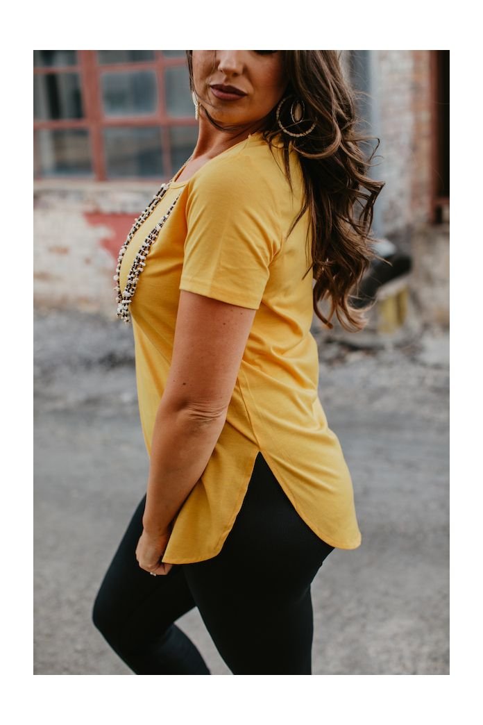 ESSENTIAL MUSTARD SHORT SLEEVE TOP WITH CURVED HEM RELAXED FIT SCOOP NECK WITH SIDE SLIT