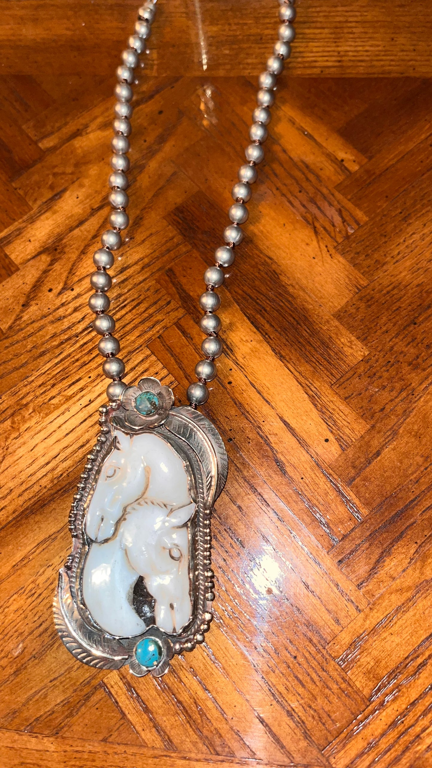 Tibetan bone carved mom & baby horse necklace