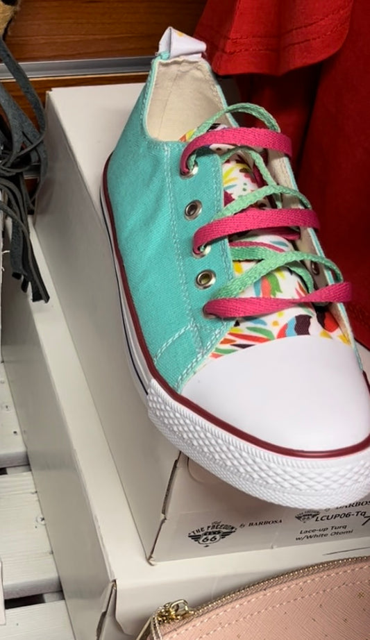 Teal and floral converse style tennis shoes