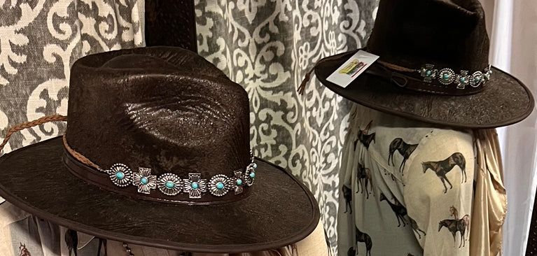 Silver concho with turquoise hat band with leather tie
