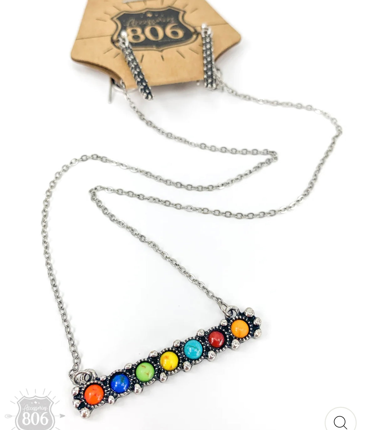 Bar necklace with multi-colored stones and silver dangle earrings